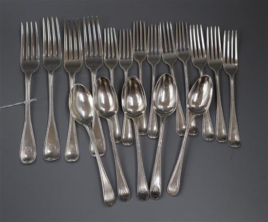 Eighteen items of 18th and 19th century silver Old English beaded pattern flatware, various dates and makers, 23.5 oz.